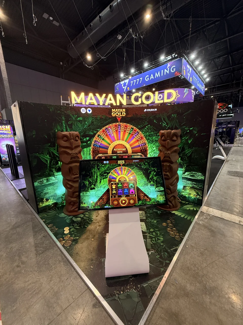 7777 Gaming Mayan Gold activation with a curved LED display at ICE Barcelona 2026