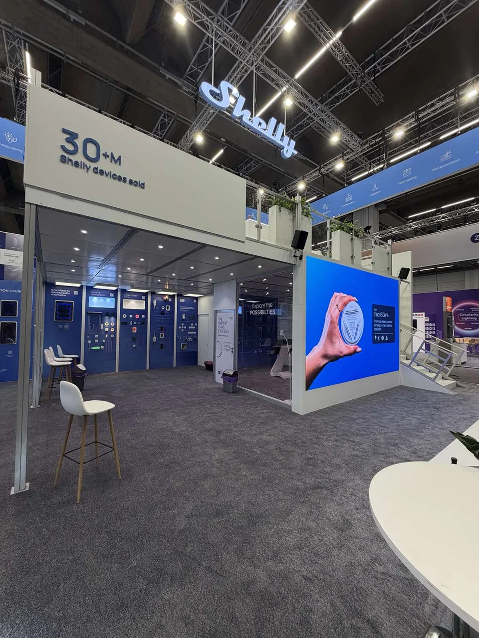 Shelly exhibition area with integrated LED wall at Light + Building 2026